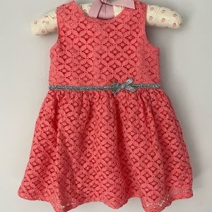 Gentle used, sized 12 month carter’s orange dress